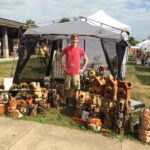 Jack Ward with Chainsaw Carvings by Colony Carvers, Amana, Iowa